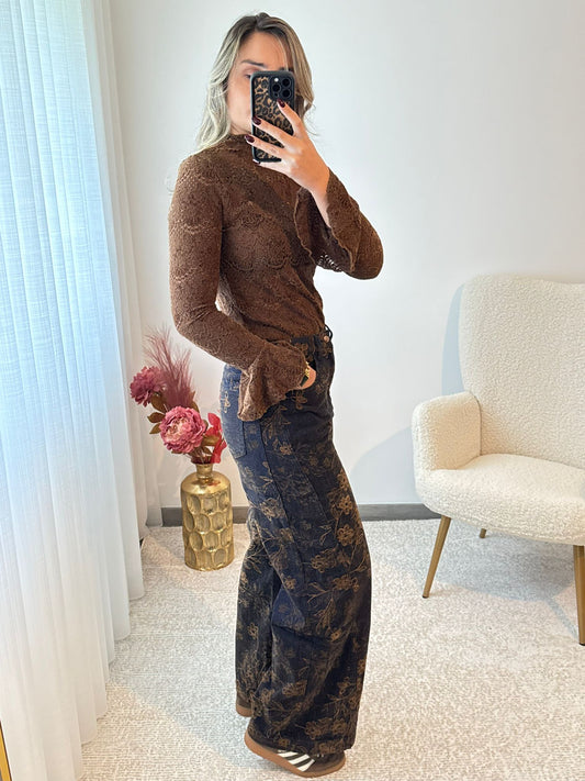 Calças flores veludo